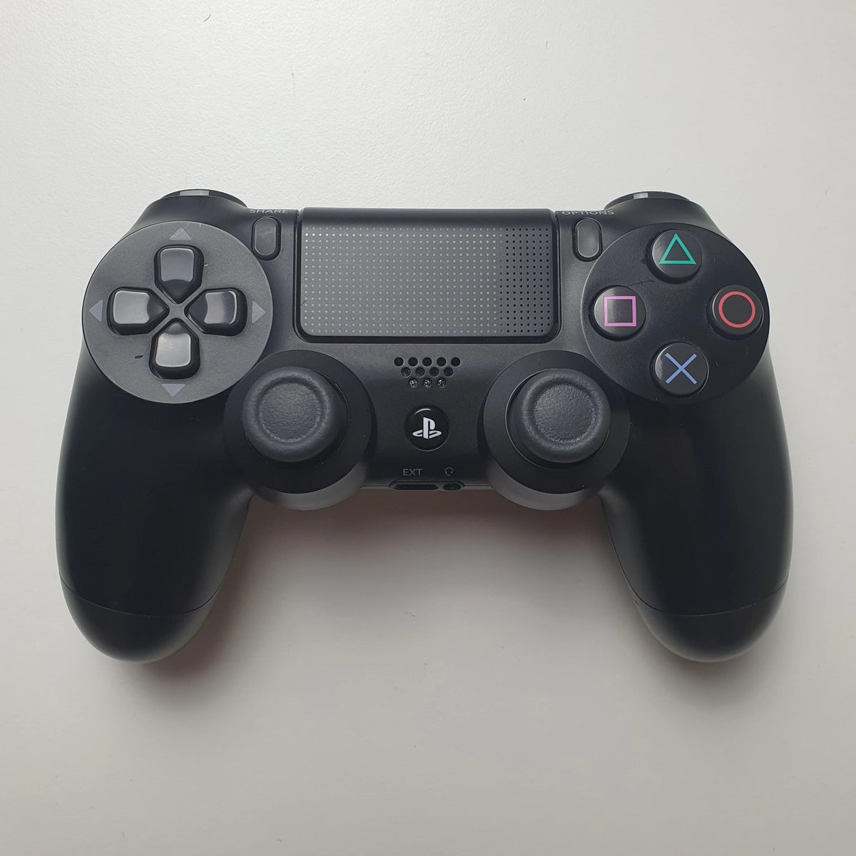 DualShock 4 Wireless Gaming Controller Replica for PS4 & PC (Bluetooth, Motion Control, Touchpad - Jet Black)